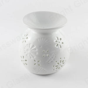 现代镂空花设计白色陶瓷油燃烧器，用于芳香疗法批发