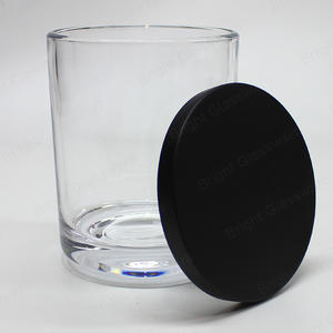 热弧形底座透明玻璃蜡烛罐，带黑色金属盖，用于制作蜡烛