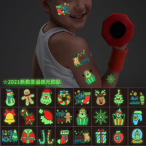 Adesivo del tatuaggio di Natale del fumetto fluorescente fluorescente impermeabile personalizzato in vendita, adesivi temporanei luminosi al buio per bambini ragazze ragazzi