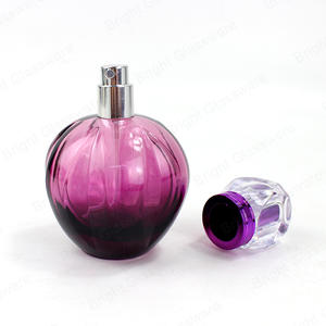 Wholesale Embossed Round Shape Gradient Color Glass Perfume Bottle WIth Cap