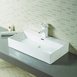 Glossy White Ceramic Counter Above Mounted Bathroom Basin