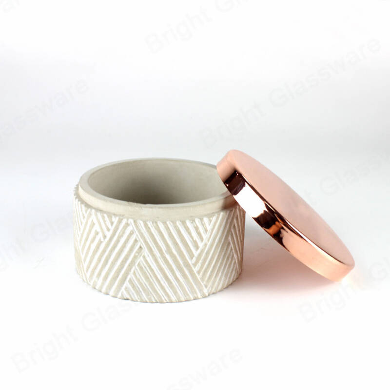 Nuevo diseño grabado gris candelabro de cemento con tapa de metal de oro rosa