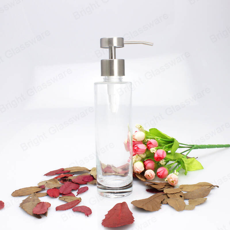 زجاجة زجاجية شفافة قابلة لإعادة الملء للشامبو مع مضخة فولاذية بدون صدأ