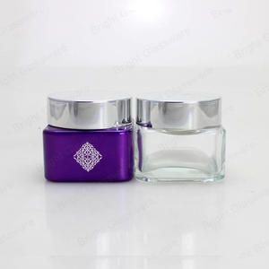 Tarro cosmético de vidrio de alta calidad de 100 ml Tarro de crema cuadrada con tapa de plata