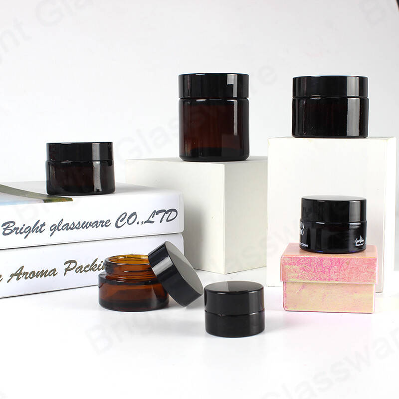 Prix d’usine bon marché stocké 5ml 10ml 20ml 25ml 30ml pots cosmétiques en verre ambré avec bouchon en plastique noir en gros