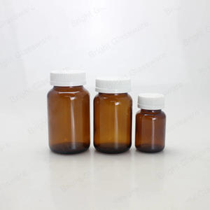Flacons de pharmacie vides à large bouche Flacon en verre médical pharmaceutique ambré avec couvercles à vis en plastique blanc