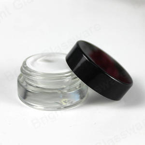 Mini 5G Embalaje ecológico Contenedor de crema para ojos Frascos cosméticos de vidrio transparente con tapa negra