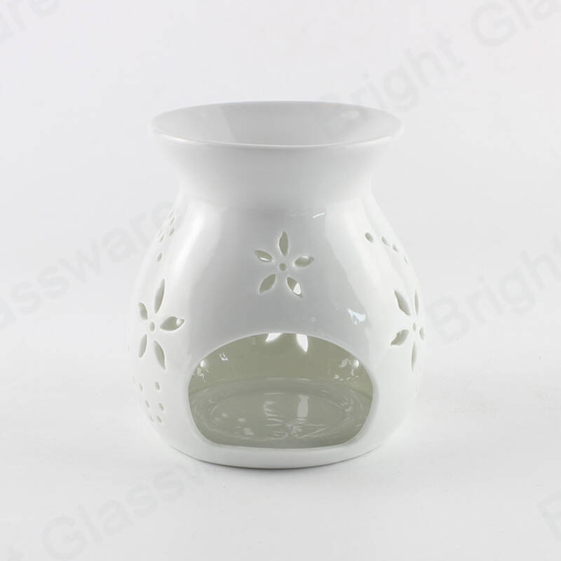家の装飾のための卸し売りの陶磁器の精油バーナーの蝋燭の瓶の蝋燭のウォーマー