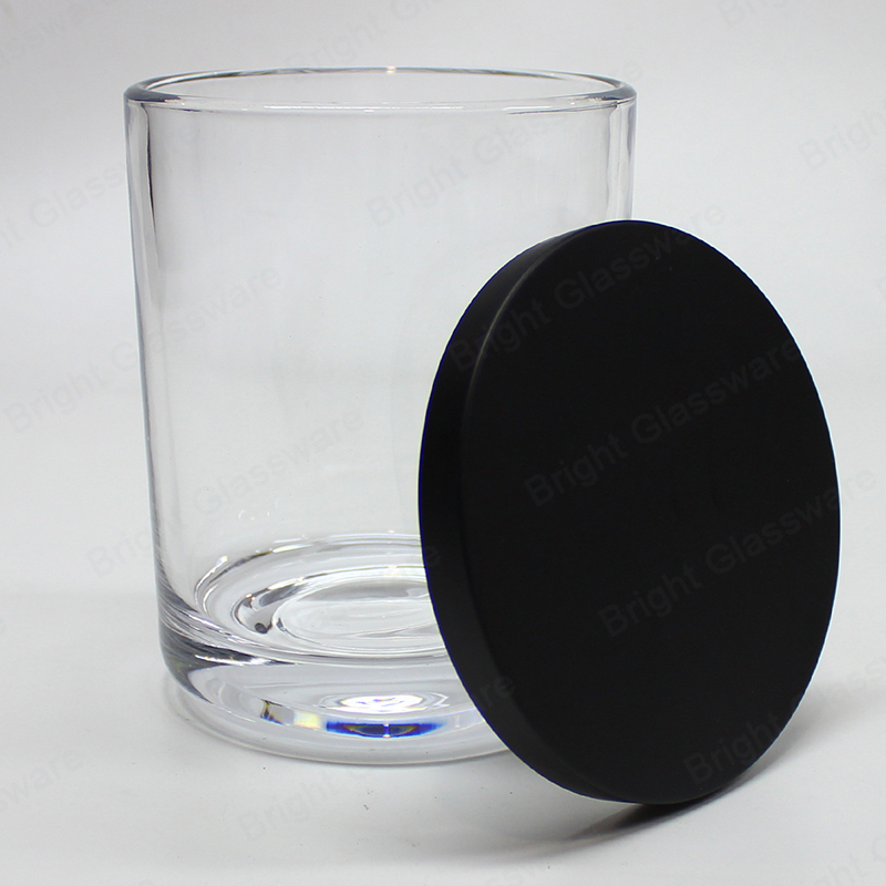 Tarro de vela de vidrio transparente de base curvada caliente con tapa de metal negro para la fabricación de velas
