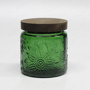 China Professional Candle Jars Glass Supplier Embossed Flower Green Glass Jar