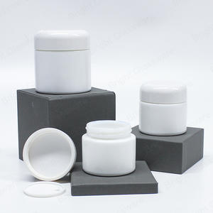 Pot de crème cosmétique à cylindre en verre blanc de haute qualité avec bouchon de courbe de vis