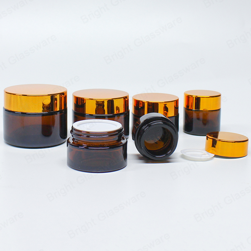 Pot en verre cosmétique ambré recyclé écologique avec couvercle de couleur or à vis
