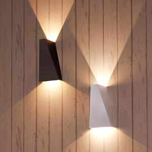 Geometric taped shade gives asymmetric up and down light,Wall Lamp
