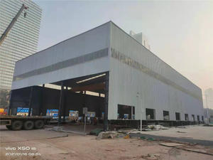 Steel Warehouse For A Construction Site With Parapet Wall Cladding