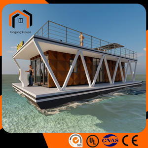 Floating houseboat is made of light steel.
