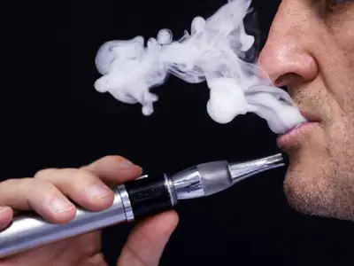 Are e-cigarettes less harmful than regular cigarettes?